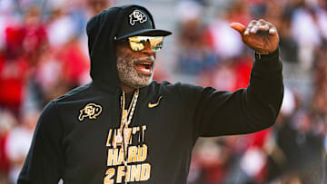 Sep 7, 2024; Lincoln, Nebraska, USA; Colorado Buffaloes head coach Deion Sanders watches warmups before the game against the Nebraska Cornhuskers at Memorial Stadium. Mandatory Credit: Dylan Widger-Imagn Images