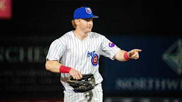 Iowa Cubs' Owen Caissie (17) makes his way to the dugout on Friday, March 28, 2025, at Principal Park in Des Moines.