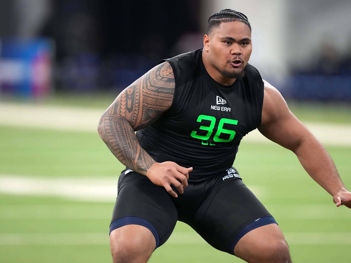 Miami Dolphins Grades for Selection of OL Jonah Savaiinaea in Round 2