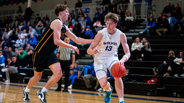 Northwest’s Landon Davis (13) drives down the baseline against Southeast Polk on Dec. 19, 2025, at Waukee Northwest. Northwest’s Landon Davis (13) drives down the baseline against Southeast Polk on Dec. 19, 2025, at Waukee Northwest.