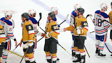 Vegas Golden Knights players shake hands with Edmonton Oilers players after the Oilers defeated the Vegas Golden Knights 1-0 during an overtime period, completing a 4-1 series win