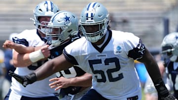 Dallas Cowboys guard Tyler Booker (52)