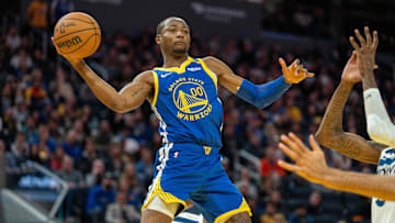 Dec 6, 2024; San Francisco, California, USA; Golden State Warriors forward Jonathan Kuminga (00) passes the basketball against the Minnesota Timberwolves during the fourth quarter at Chase Center. Mandatory Credit: Neville E. Guard-Imagn Images