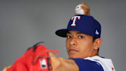 Feb 20, 2024; Surprise, AZ, USA; Texas Rangers pitcher Gerardo Carrillo poses for a photo during Media Day at Surprise Stadium. Mandatory Credit: Joe Camporeale-Imagn Images