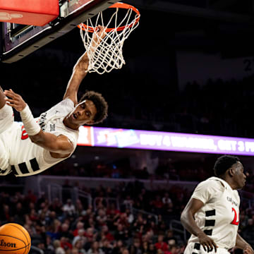 Cincinnati Bearcats forward Baba Miller (18) dunks in the second half of the NCAA basketball game against the Georgia State Panthers at Fifth Third Arena in Cincinnati on Nov. 7, 2025.