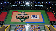 The Green Bay 2025 logo on the main stage before the NFL Draft at Lambeau Field.