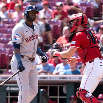 Houston Astros left fielder Yordan Alvarez walks back to the dugout after striking out in the seventh inning.