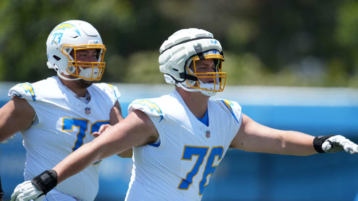 May 29, 2024; Costa Mesa, CA, USA; Los Angeles Chargers offensive tackle Joe Alt (76) wears a Guardian helmet cap during organized team activities at Hoag Performance Center. Mandatory Credit: Kirby Lee-USA TODAY Sports