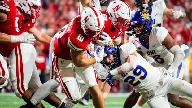 Nebraska Cornhuskers quarterback Heinrich Haarberg (10) runs against Northern Iowa