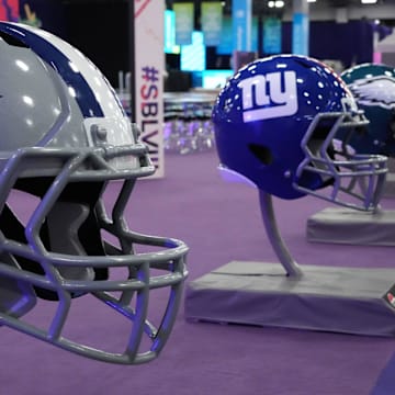Feb 9, 2024; Las Vegas, NV, USA; Large Dallas Cowboys and New York Giants helmets at the NFL Experience at the Mandalay Bay South Convention Center. Mandatory Credit: Kirby Lee-Imagn Images