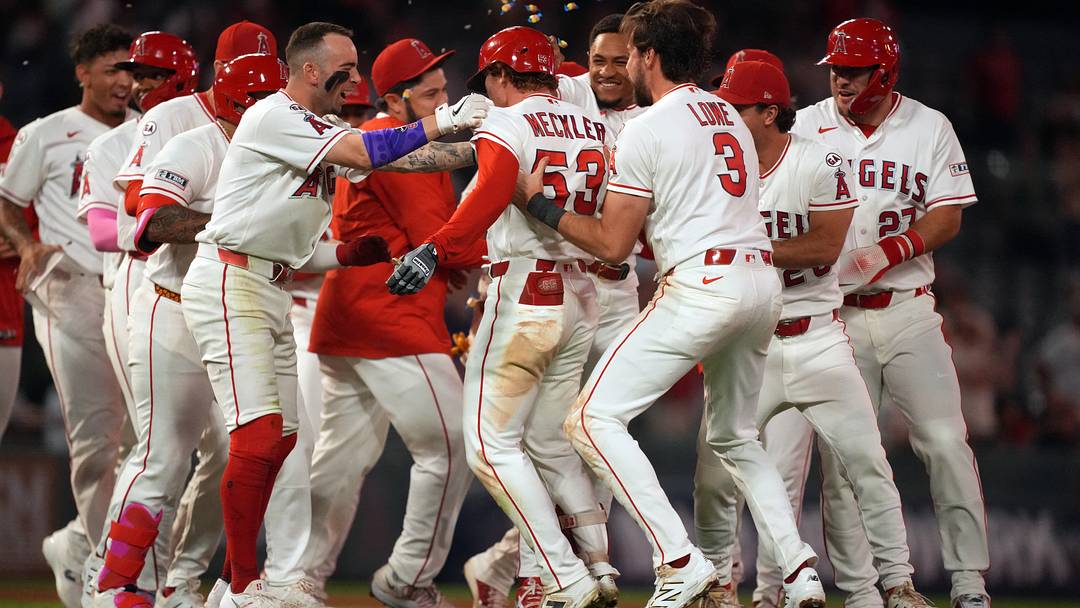 Sep 17, 2026; Anaheim, California, USA; Los Angeles Angels left fielder Wade Meckler (53) celebrates with teammates after hitting a walk-off single in the 10th inning against the Minnesota Twins at Angel Stadium. Mandatory Credit: Kirby Lee-Imagn Images