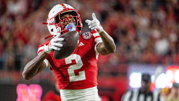 Sep 6, 2025; Lincoln, Nebraska, USA; Nebraska Cornhuskers wide receiver Jacory Barney Jr. (2) celebrates after a catch against the Akron Zips during the third quarter at Memorial Stadium. Mandatory Credit: Dylan Widger-Imagn Images