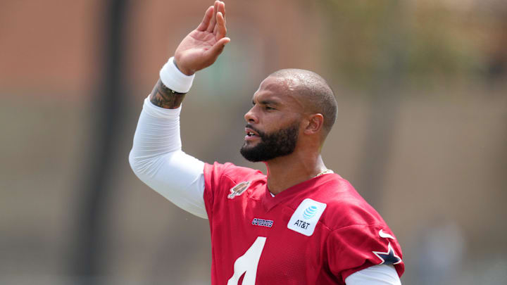 Dallas Cowboys quarterback Dak Prescott (4) reacts during training camp at the River Ridge Fields.