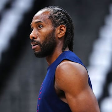 May 3, 2025; Denver, Colorado, USA; LA Clippers forward Kawhi Leonard (2) warms up before the game against the Denver Nuggets during game seven of first round for the 2025 NBA Playoffs at Ball Arena. Mandatory Credit: Ron Chenoy-Imagn Images