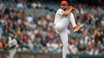 Jul 30, 2024; San Francisco, California, USA;  San Francisco Giants starting pitcher Robbie Ray (23) delivers a pitch against the Oakland Athletics during the first inning at Oracle Park. Neville E. Guard-Imagn Images