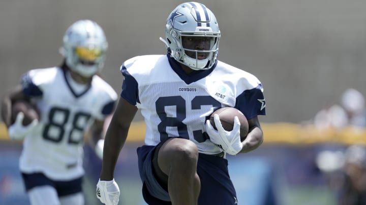 Jul 27, 2022; Oxnard, CA, USA; Dallas Cowboys receiver James Washington (83) carries the ball during training camp at the River Ridge Fields. Mandatory Credit: Kirby Lee-USA TODAY Sports