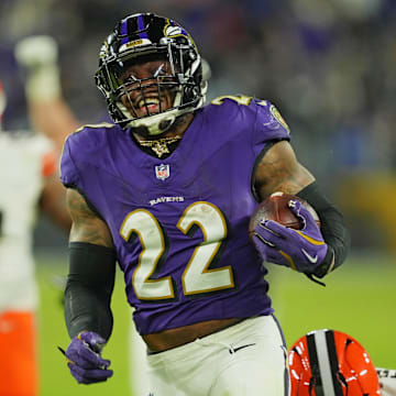 Jan 4, 2025; Baltimore, Maryland, USA; Baltimore Ravens running back Derrick Henry (22) runs for a touchdown during the fourth quarter against the Cleveland Browns at M&T Bank Stadium. Mandatory Credit: Mitch Stringer-Imagn Images