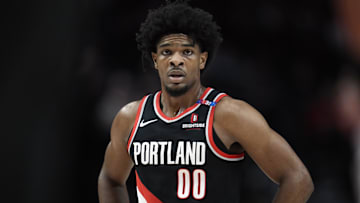 Jan 14, 2025; Portland, Oregon, USA; Portland Trail Blazers guard Scoot Henderson (00) looks on during the first half against the Brooklyn Nets at Moda Center. Mandatory Credit: Soobum Im-Imagn Images