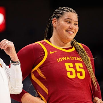Iowa State's Audi Crooks (55) talks with Iowa State head coach Bill Fennelly ahead of the second half against Drake on Nov. 20, 2025, at the Knapp Center in Des Moines.