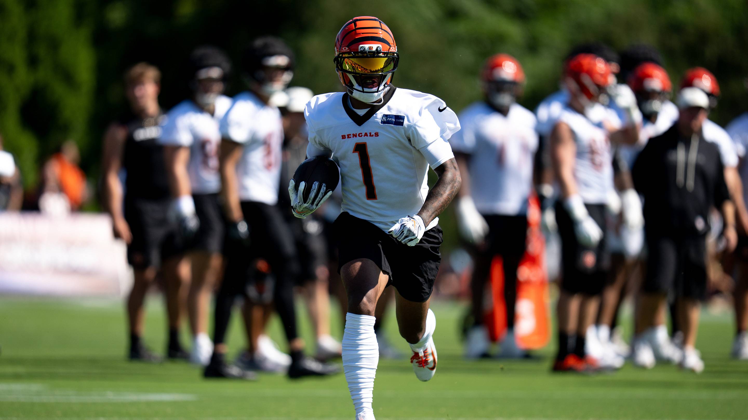 Cincinnati Bengals wide receiver Ja'Marr Chase (1) runs with the ball during the Cincinnati Bengals Training Camp 2026 at Kettering Practice Field in Cincinnati on Thursday, July 30, 2026.