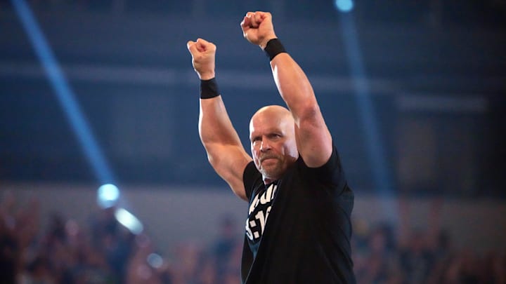 Apr 2, 2022; Arlington, TX, USA; Stone Cold Steve Austin enters the arena during WrestleMania at AT&T Stadium. Mandatory Credit: Joe Camporeale-Imagn Images Apr 2, 2022; Arlington, TX, USA; Stone Cold Steve Austin enters the arena during WrestleMania at AT&T Stadium. Mandatory Credit: Joe Camporeale-Imagn Images