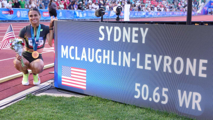 Sydney McLaughlin-Levrone celebrates after winning the women's 400m hurdles in a world record 50.65 seconds Sunday.