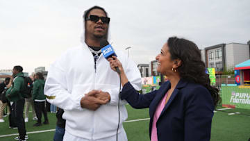 Penn State Nittany Lions defensive end Abdul Carter (left) is interviewed by CBS Sports reporter Aditi Kinkhabwala