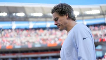 Nov 23, 2025; Cincinnati, Ohio, USA; Injured Cincinnati Bengals quarterback Joe Burrow (9) walks onto the field before the first quarter against the New England Patriots at Paycor Stadium. 