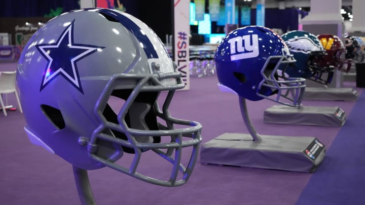 Feb 9, 2024; Las Vegas, NV, USA; Large Dallas Cowboys and New York Giants helmets at the NFL Experience at the Mandalay Bay South Convention Center. Mandatory Credit: Kirby Lee-USA TODAY Sports