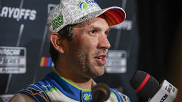 Sep 4, 2024; Charlotte, North Carolina, USA; Daniel Suarez speaks to media members during the NASCAR Playoffs Media Day at the Charlotte Convention Center. Mandatory Credit: Jim Dedmon-Imagn Images