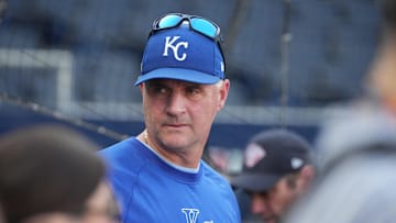 Oct 10, 2024; Kansas City, Missouri, USA; Kansas City Royals manager Matt Quatraro (33) during warmups before a game against the New York Yankees for game four of the ALDS for the 2024 MLB Playoffs at Kauffman Stadium. Mandatory Credit: Denny Medley-Imagn Images