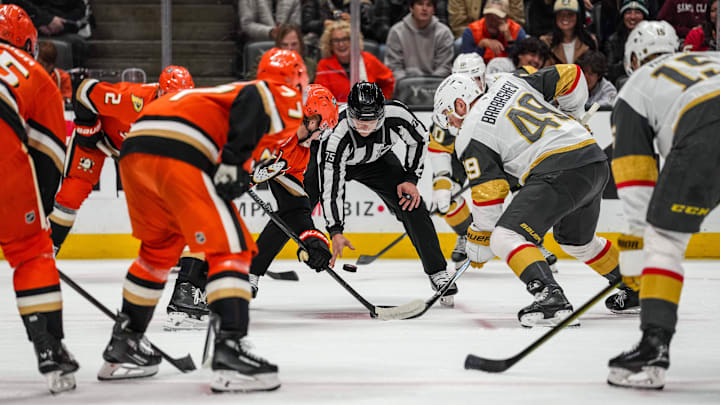 Nov 22, 2025; Anaheim, California, USA; Face off in the game between the Anaheim Ducks and the Vegas Golden Knights during the first period at Honda Center. Mandatory Credit: Corinne Votaw-Imagn Images