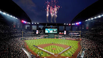 Fireworks go off after the national anthem during the Opening Day game between the Diamondbacks and the Rockies at Chase Field in 2024.
