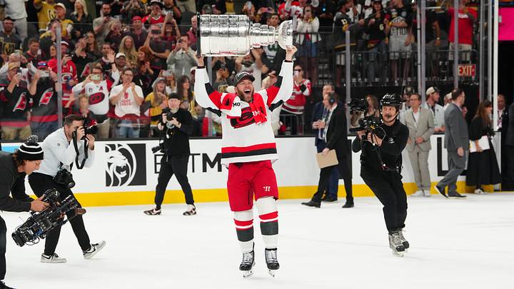 Jun 14, 2026; Las Vegas, Nevada, USA; Carolina Hurricanes left wing Taylor Hall (71) raises the the Stanley Cup after defeating the Vegas Golden Knights in game six of the 2026 Stanley Cup Final at T-Mobile Arena. Mandatory Credit: Stephen R. Sylvanie-Imagn Images
