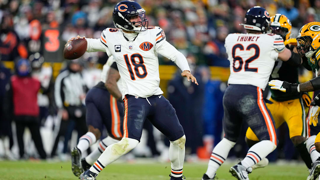 Dec 7, 2025; Green Bay, Wisconsin, USA; Chicago Bears quarterback Caleb Williams (18) looks to throw in the first quarter against the Green Bay Packers at Lambeau Field. Mandatory Credit: Jeff Hanisch-Imagn Images