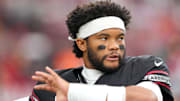 Oct 5, 2025; Glendale, Arizona, USA; Arizona Cardinals quarterback Kyler Murray (1) warms up before their game against the Tennessee Titans at State Farm Stadium. Mandatory Credit: Joe Camporeale-Imagn Images