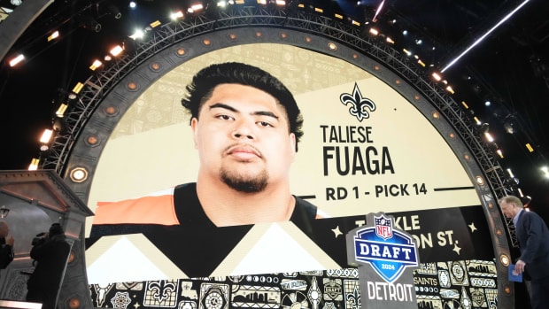 Oregon State tackle Taliese Fuaga announced as the 14th pick of the first round by the Saints during the NFL Draft