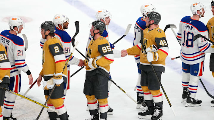 Vegas Golden Knights players shake hands with Edmonton Oilers players after the Oilers won the series.