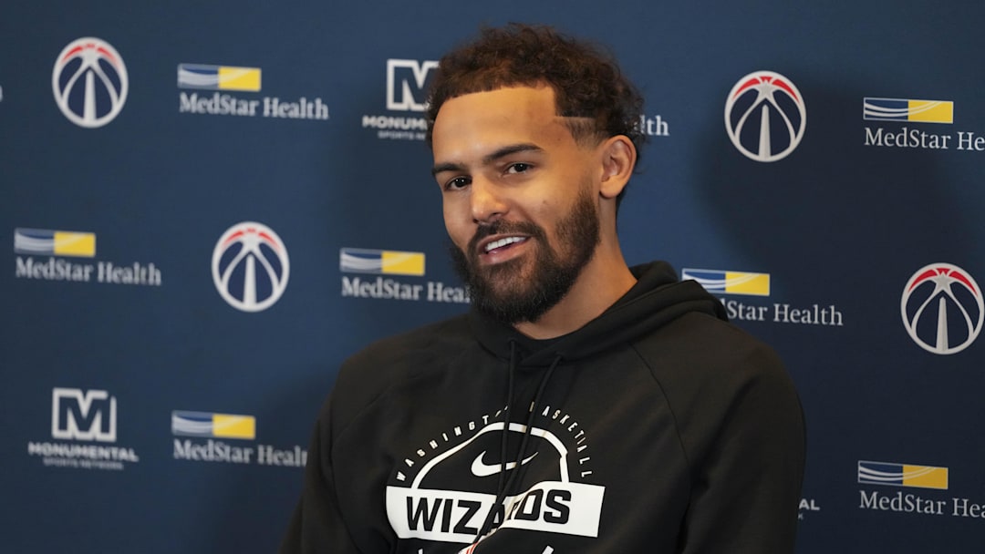 Feb 24, 2026; Atlanta, Georgia, USA; Washington Wizards guard Trae Young (3) meets with the media during his first return to play the Atlanta Hawks at State Farm Arena. Mandatory Credit: Dale Zanine-Imagn Images