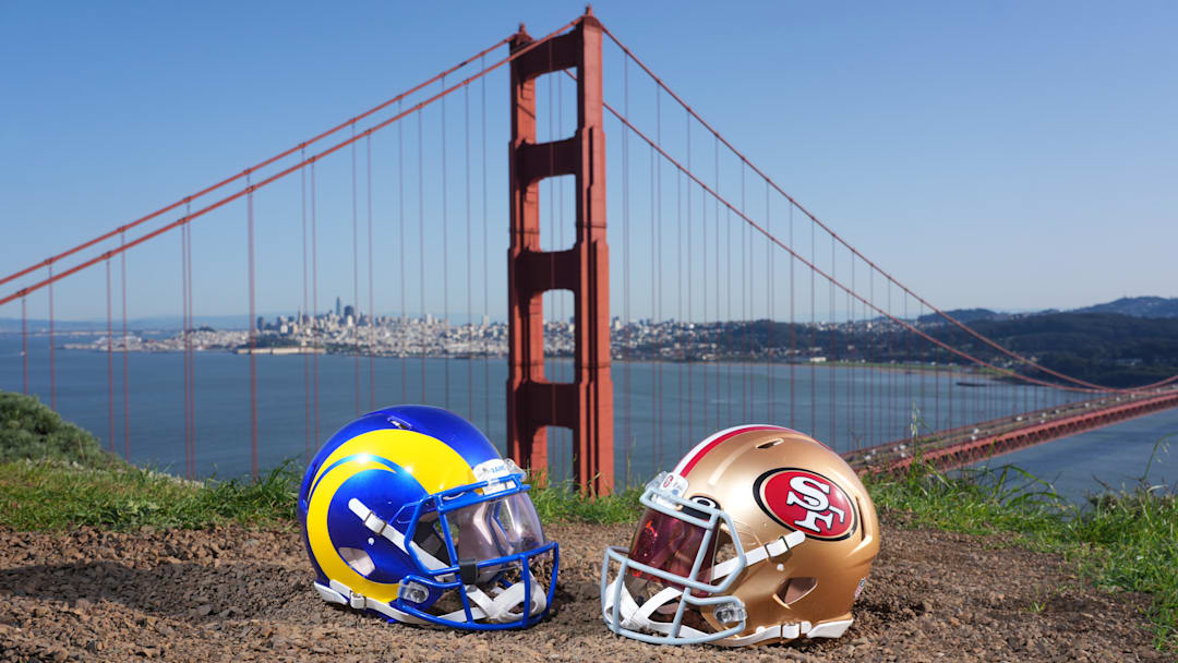 Jan 29, 2026; San Francisco, California, USA; Los Angeles Rams and San Francisco 49ers helmets with the Golden Gate bridge as a backdrop. Mandatory Credit: Kirby Lee-Imagn Images