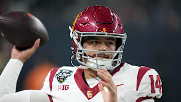 Dec 27, 2024; Las Vegas, NV, USA; Southern California Trojans quarterback Jayden Maiava (14) throws the ball against the Texas A&M Aggies in the first half at Allegiant Stadium. Mandatory Credit: Kirby Lee-Imagn Images