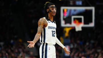 Mar 3, 2023; Denver, Colorado, USA; Memphis Grizzlies guard Ja Morant (12) reacts to a foul called in the second half against the Denver Nuggets at Ball Arena. Mandatory Credit: Ron Chenoy-USA TODAY Sports