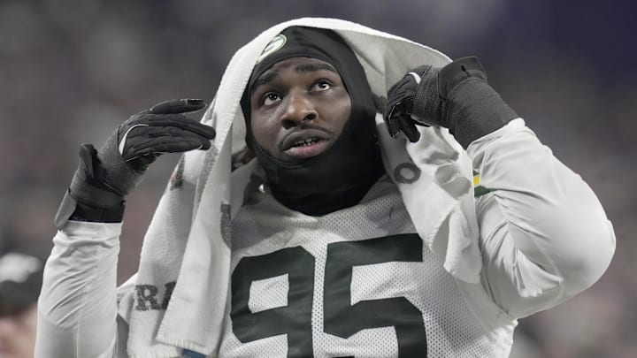 Dec 29, 2024; Minneapolis, Minnesota, USA; Green Bay Packers defensive tackle Devonte Wyatt (95) heads to the locker room during the third quarter against the Minnesota Vikings at U.S. Bank Stadium. Mandatory Credit: Mark Hoffman/USA TODAY NETWORK-Wisconsin via Imagn Images