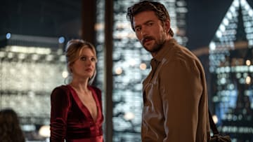 (from left) Violet (Meghann Fahy) and Henry (Brandon Sklenar) in Drop 