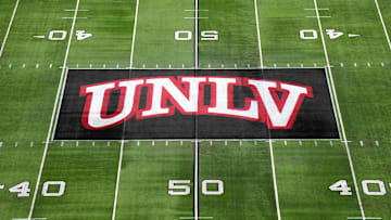 The UNLV Rebels logo at midfield during the Mountain West Championship at Allegiant Stadium. 