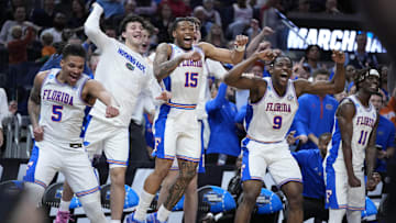 Mar 27, 2025; San Francisco, CA, USA; Florida Gators guard Alijah Martin (15), guard Will Richard (5) and center Rueben Chinyelu (9) celebrate on the Florida Gators bench during the second half against the Maryland Terrapins during a West Regional semifinal of the 2025 NCAA tournament at Chase Center. Mandatory Credit: Kyle Terada-Imagn Images