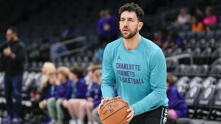 Feb 14, 2024; Charlotte, North Carolina, USA; Charlotte Hornets guard Vasa Micic (22) during pregame warm ups against the Atlanta Hawks at Spectrum Center. Mandatory Credit: Jim Dedmon-Imagn Images