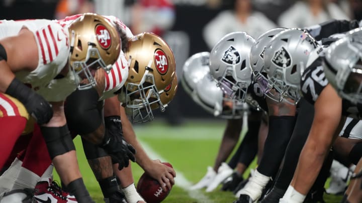 Aug 23, 2024; Paradise, Nevada, USA; A general overall view of San Francisco 49ers and Las Vegas Raiders helmets at the line of scrimmage at Allegiant Stadium. Mandatory Credit: Kirby Lee-USA TODAY Sports