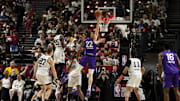 Jul 14, 2025; Las Vegas, NV, USA; Utah Jazz forward Kyle Filipowski (22) scores against the San Antonio Spurs during the second half in a NBA basketball game at the Thomas & Mack Center. Mandatory Credit: Lucas Peltier-Imagn Images