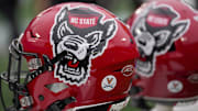 Dec 30, 2022; Charlotte, NC, USA; North Carolina State Wolfpack helmets during the first half against the Maryland Terrapins in the 2022 Duke's Mayo Bowl at Bank of America Stadium. Mandatory Credit: Jim Dedmon-Imagn Images